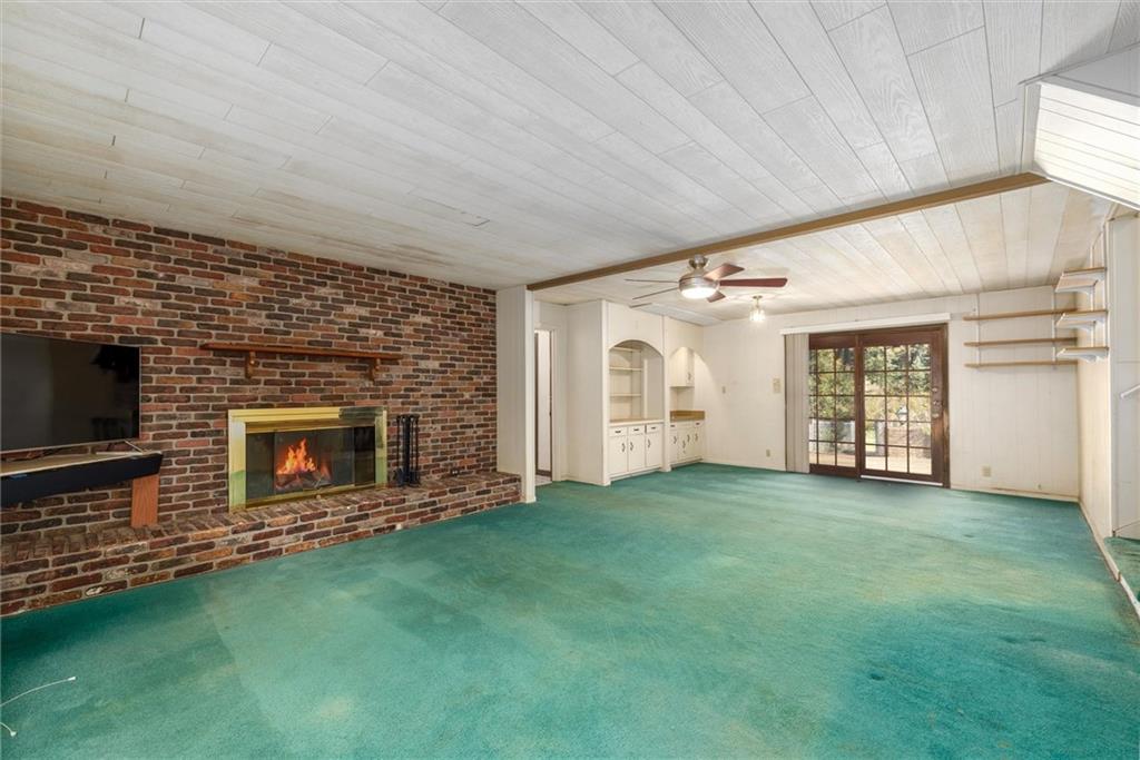 5416 Pheasant Run Smoke Rise, GA 30087 - Photo 29 of 47 a view of a porch with a fireplace