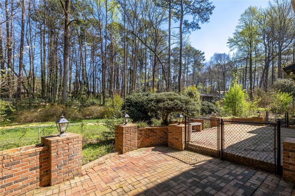 5416 Pheasant Run Smoke Rise, GA 30087 - Photo 40 of 47 a view of a bench in the garden