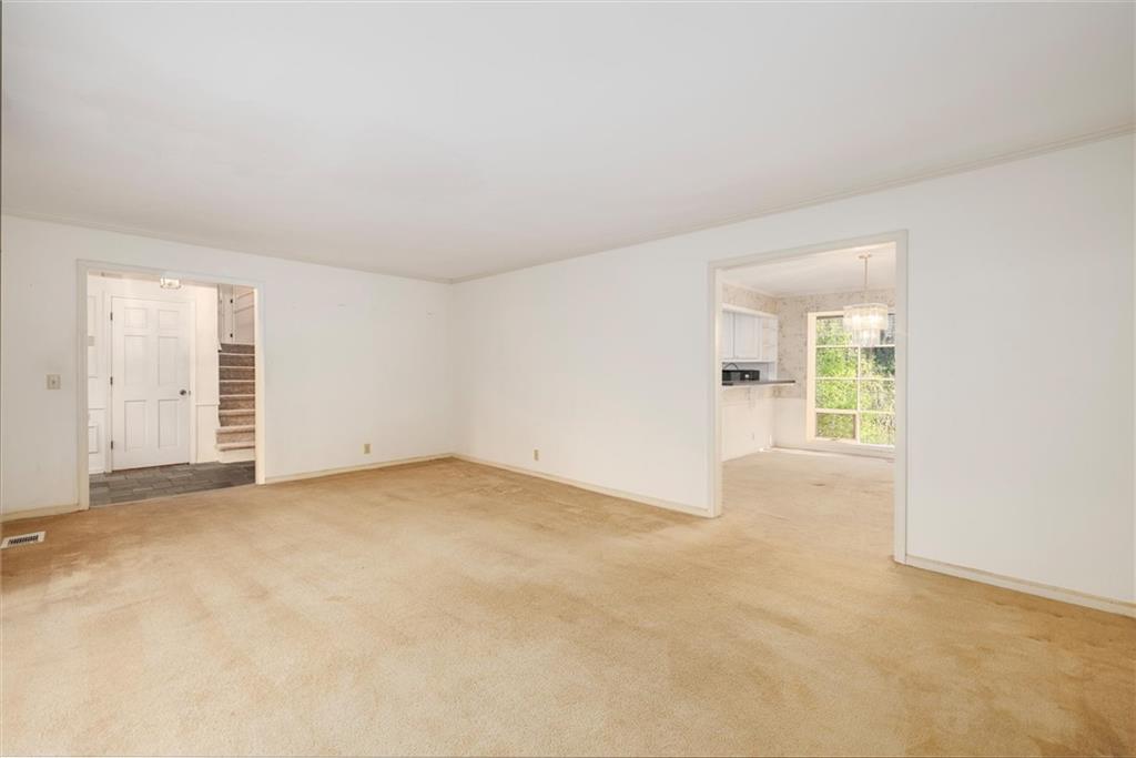 5416 Pheasant Run Smoke Rise, GA 30087 - Photo 10 of 47 an empty room with windows