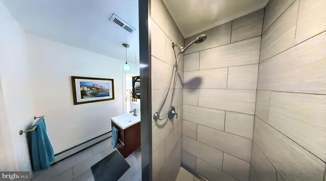 a bedroom with a bed and cabinets