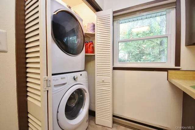 a utility room with dryer and washer