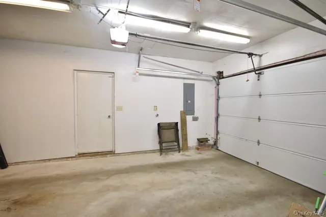 a view of empty room with ceiling fan