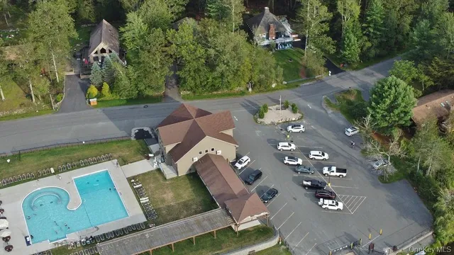 an aerial view of a house with outdoor space