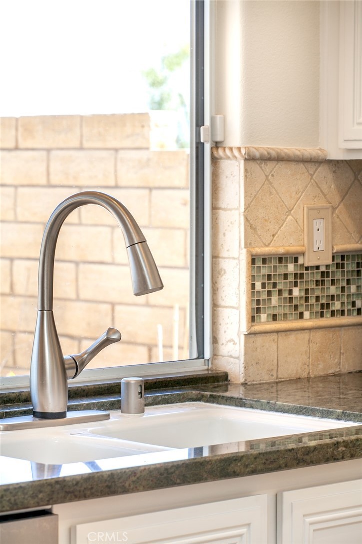 26211 Reade Place Stevenson Ranch, CA 91381 - Photo 15 of 42 a view of a living room with a sink and a window