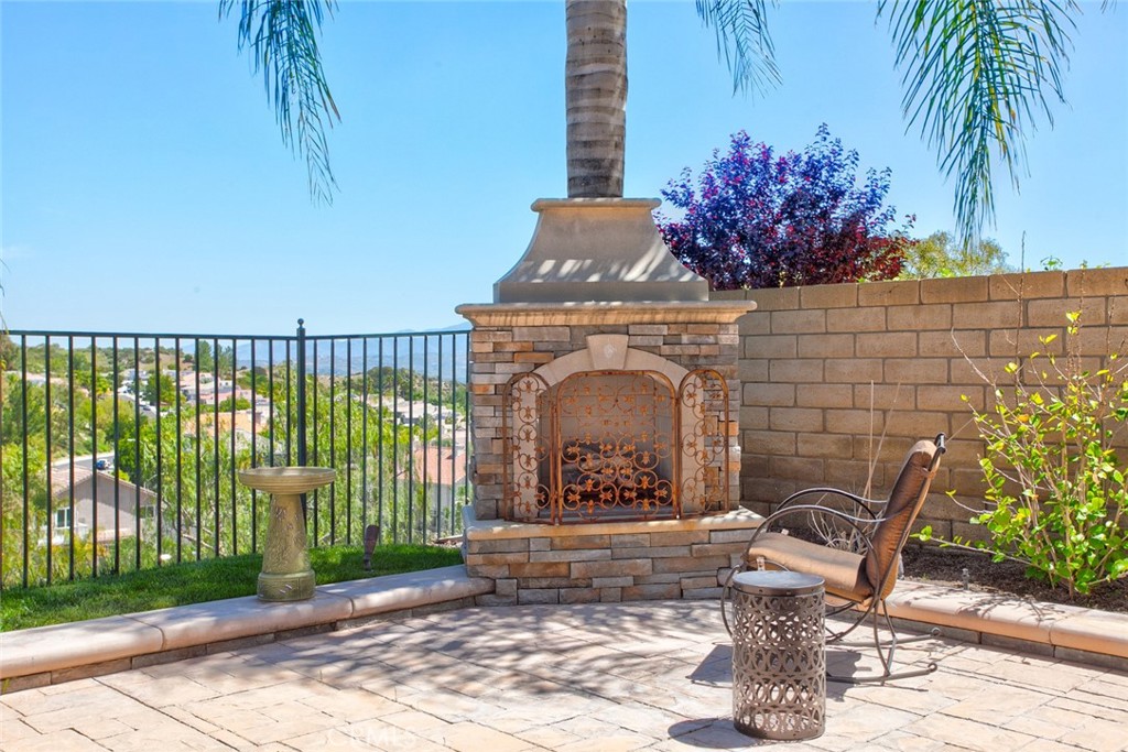 26211 Reade Place Stevenson Ranch, CA 91381 - Photo 20 of 42 a view of a house with backyard and sitting area