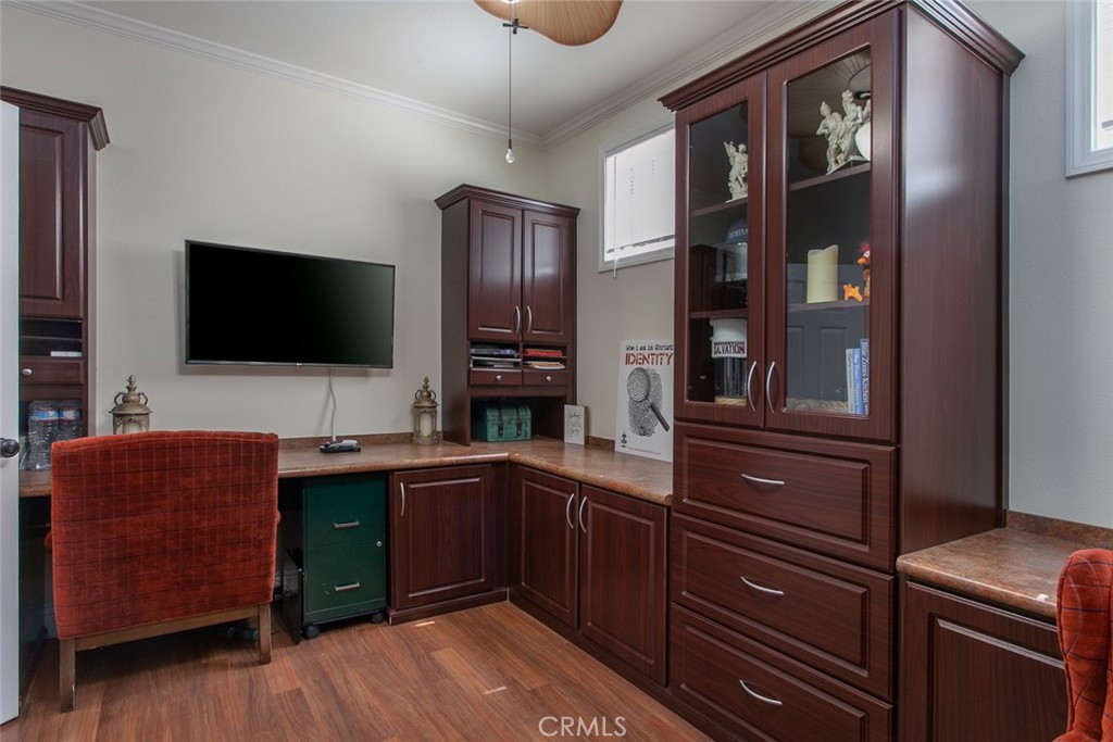26211 Reade Place Stevenson Ranch, CA 91381 - Photo 41 of 42 a kitchen with stainless steel appliances granite countertop a refrigerator and a stove top oven