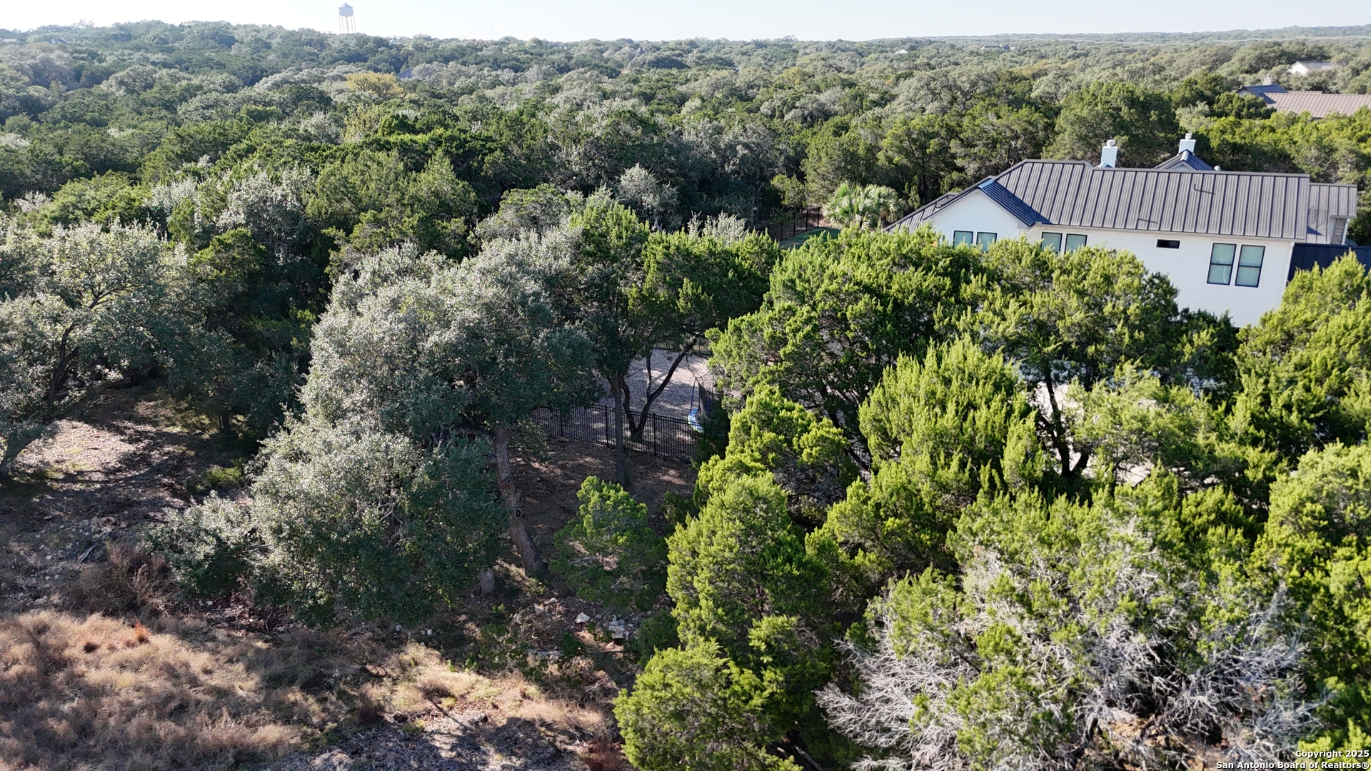 27227 Eichenbaum Road New Braunfels, TX 78132 - Photo 16 of 16 an aerial view of house with yard and outdoor seating