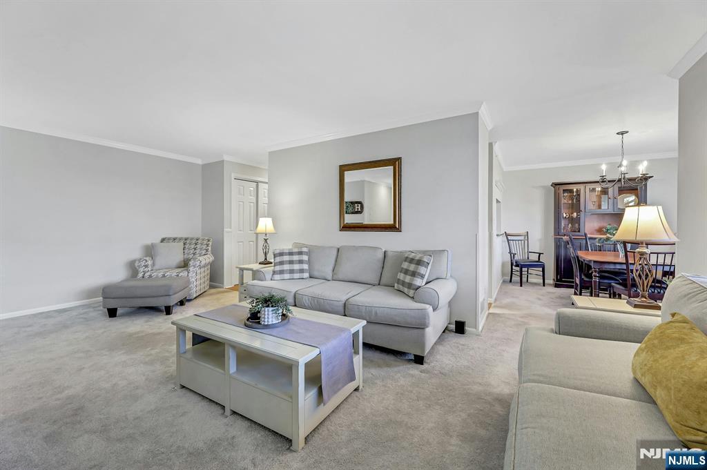 1712 Faulkner Court Mahwah, NJ 07430 - Photo 7 of 17 a living room with furniture and lamp