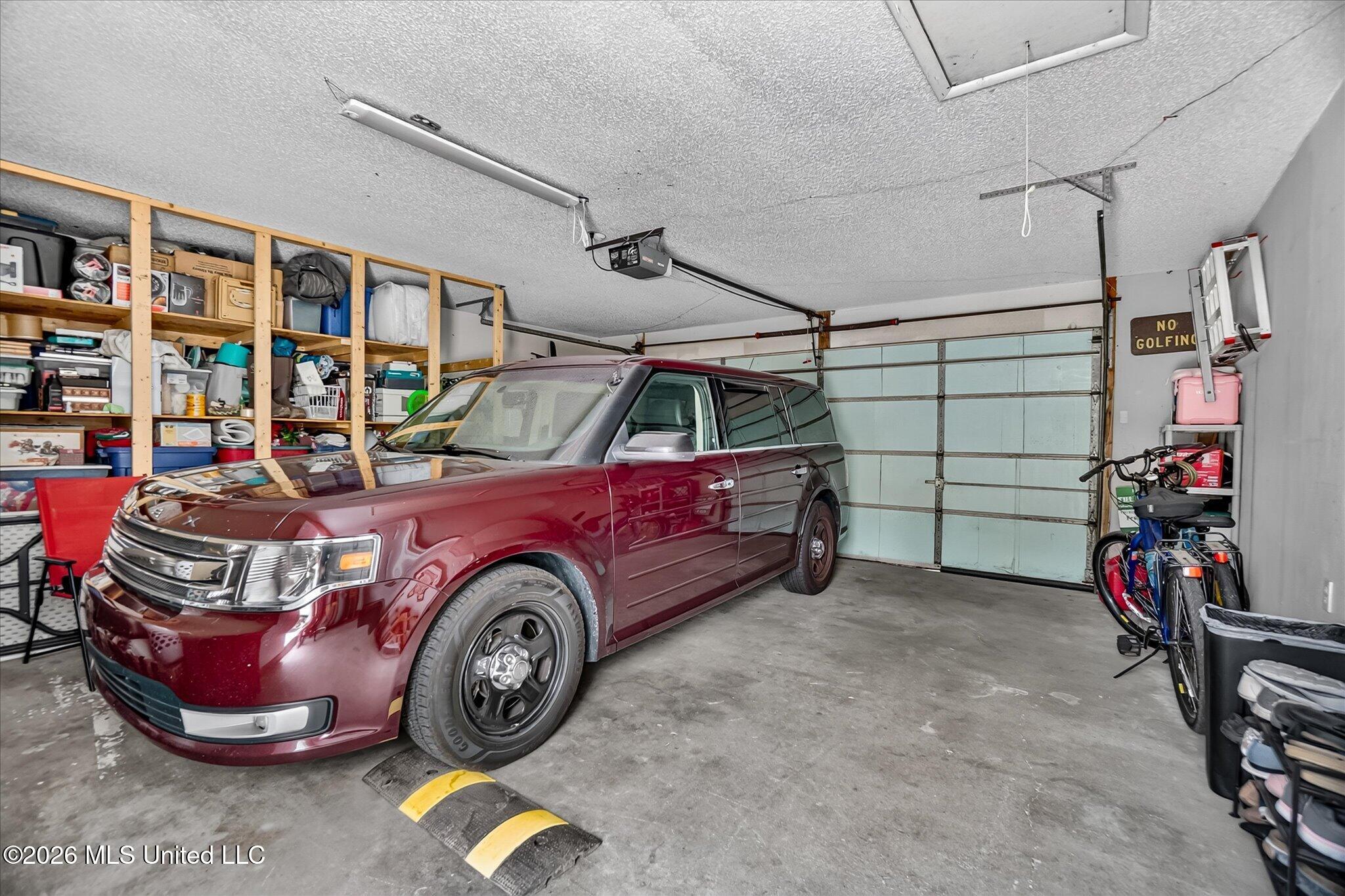 9211 Pointe Aux Chenes Road Ocean Springs, MS 39564 - Photo 25 of 57 Garage