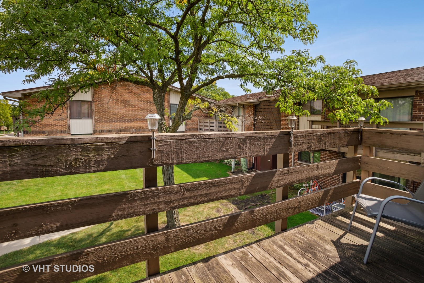 456 Raintree Court, Unit 2D Glen Ellyn, IL 60137 - Photo 10 of 10 a view of outdoor space and deck