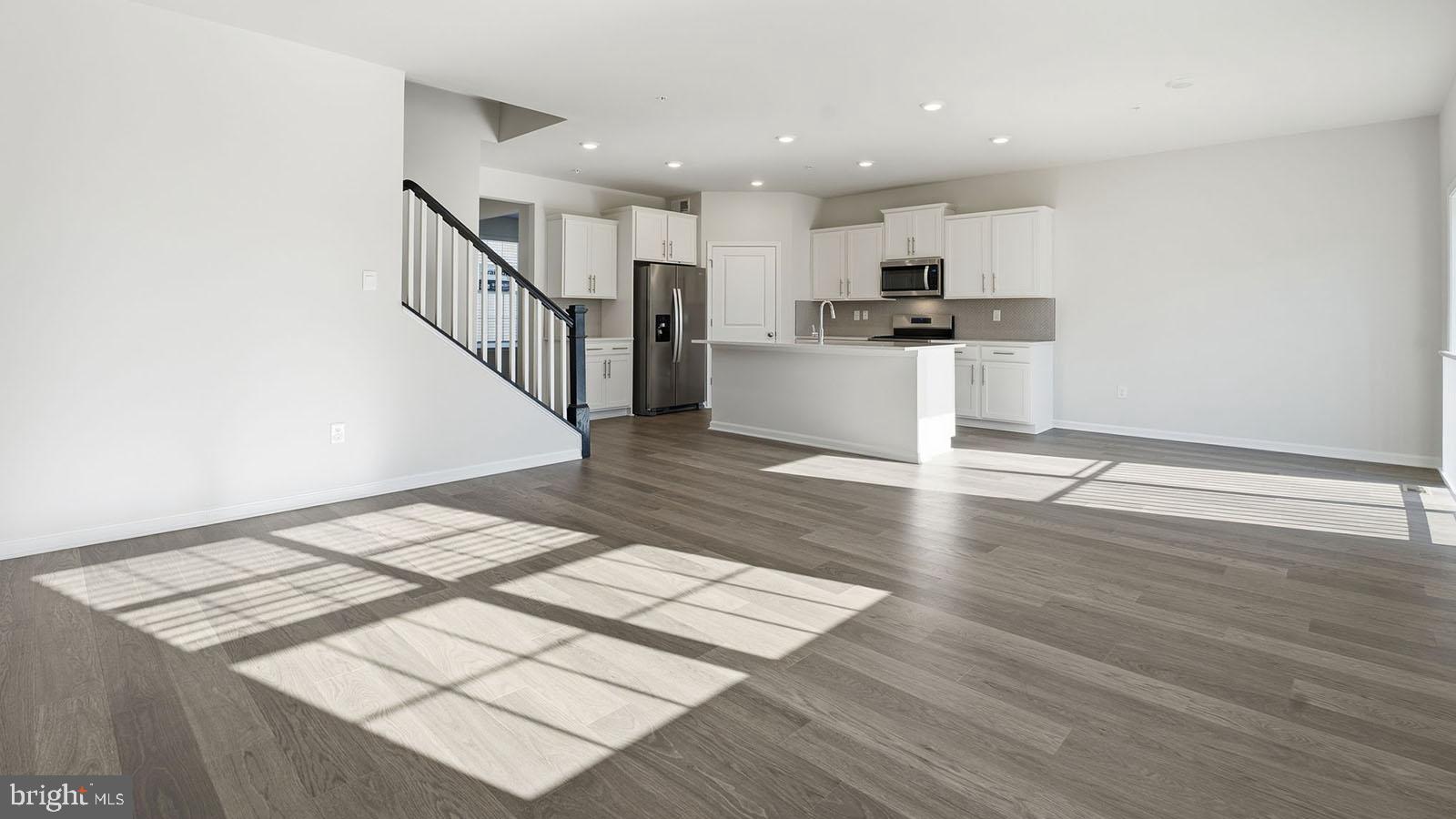 8110 Cypress Pt Drive Rosedale, MD 21237 - Photo 7 of 37 a view of kitchen with wooden floor and electronic appliances