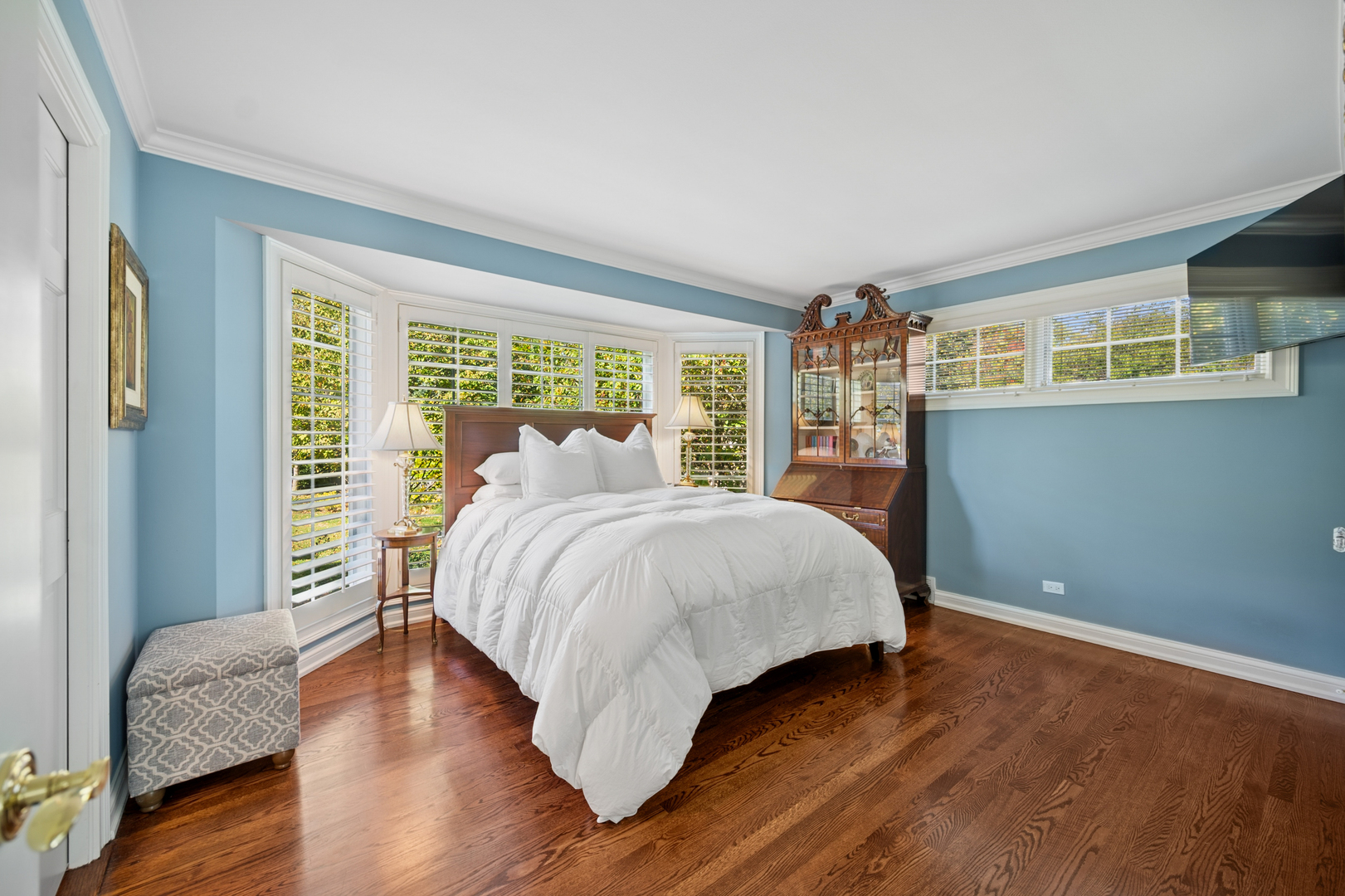 1144 Ranch Road Lake Forest, IL 60045 - Photo 24 of 41 a bedroom with a bed and wooden floor