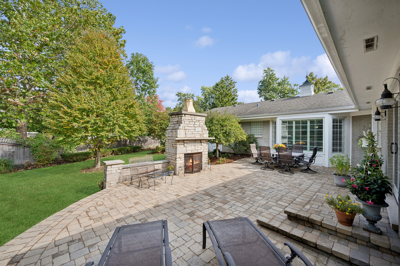 1144 Ranch Road Lake Forest, IL 60045 - Photo 32 of 41 a view of a house with sitting area and garden