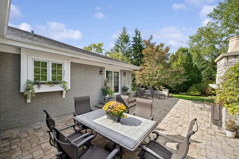 a view of a backyard with a patio