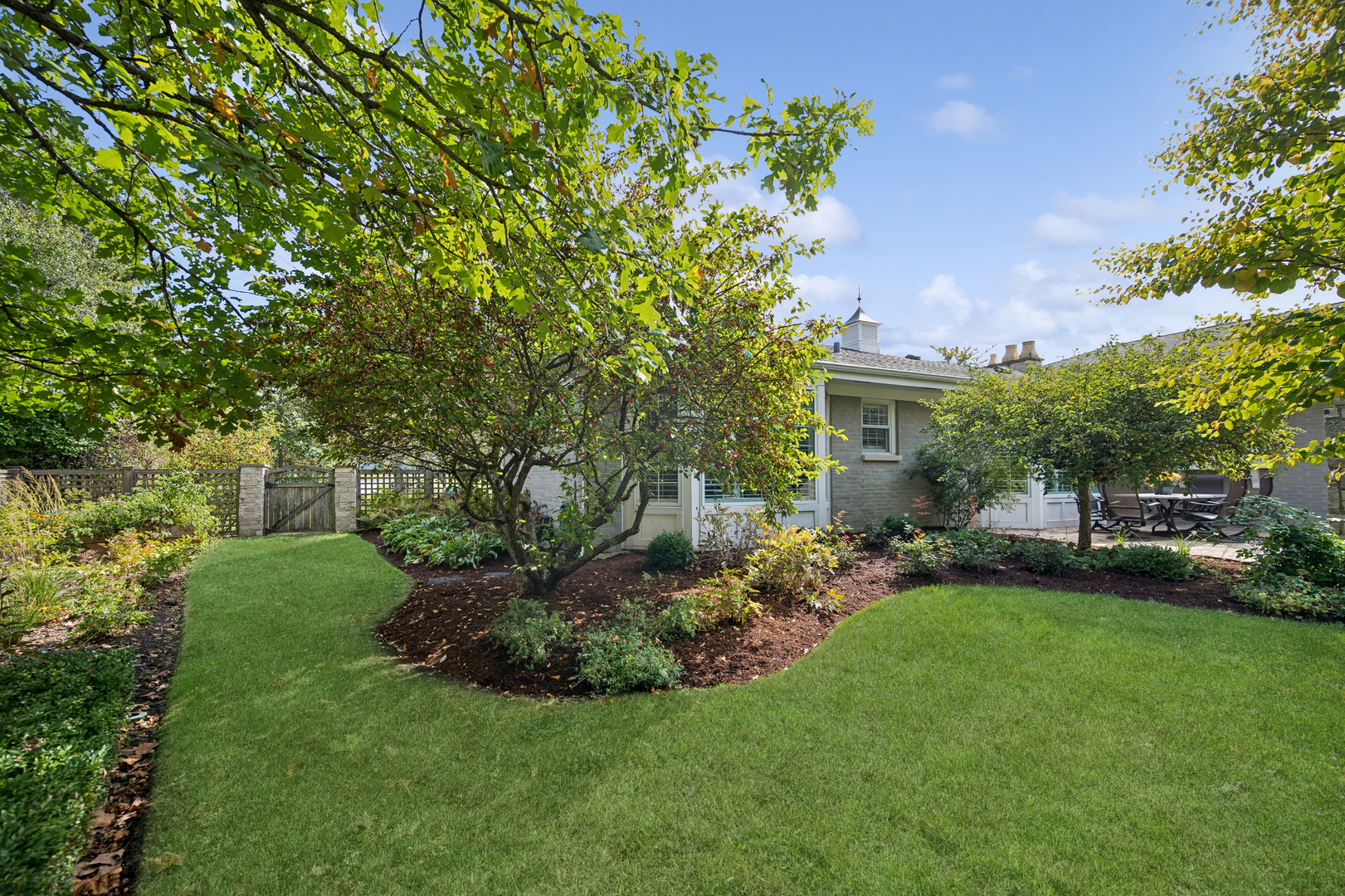 1144 Ranch Road Lake Forest, IL 60045 - Photo 38 of 41 a view of a garden with a building in front of it