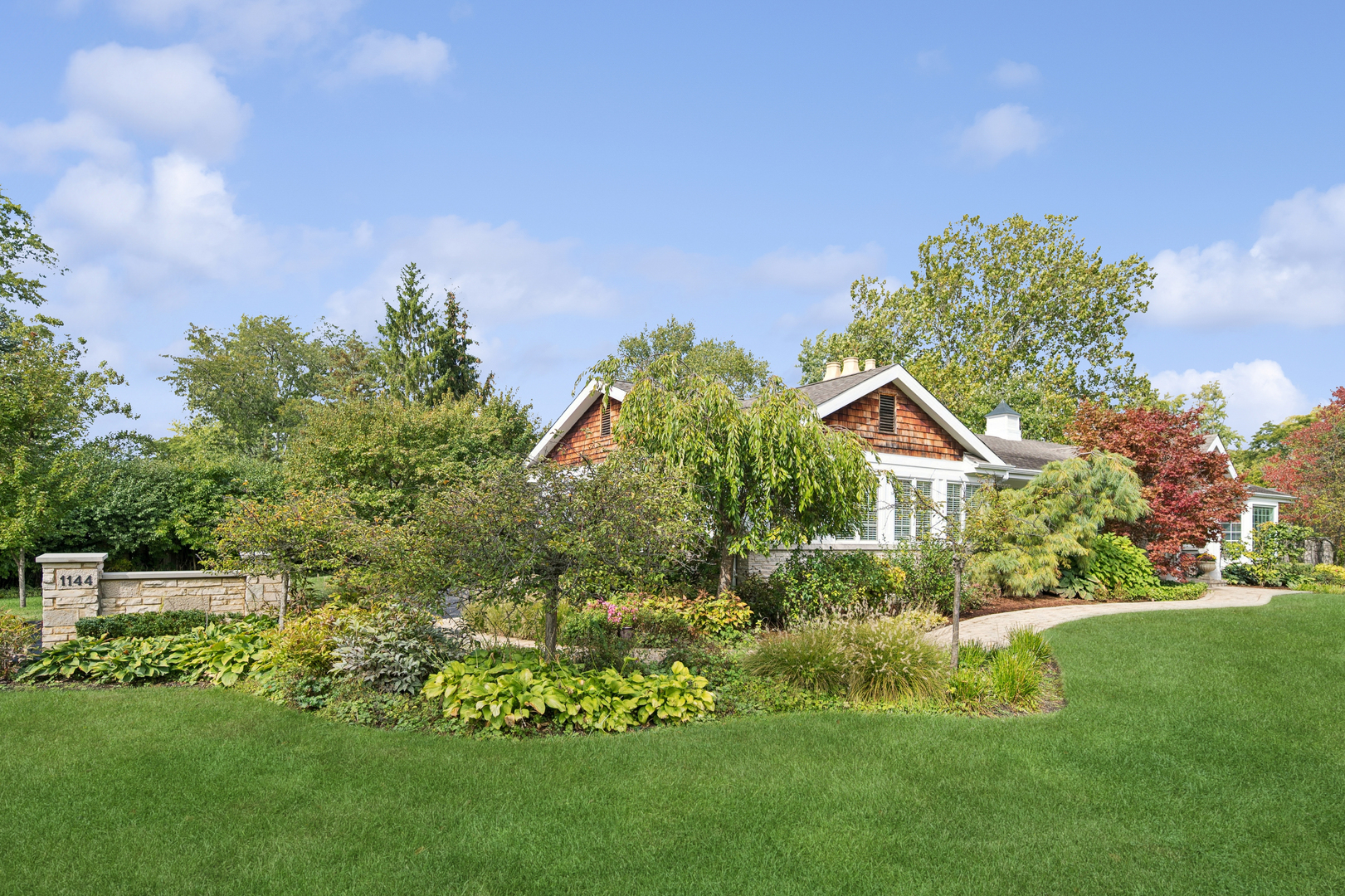 1144 Ranch Road Lake Forest, IL 60045 - Photo 39 of 41 a front view of a house with a yard