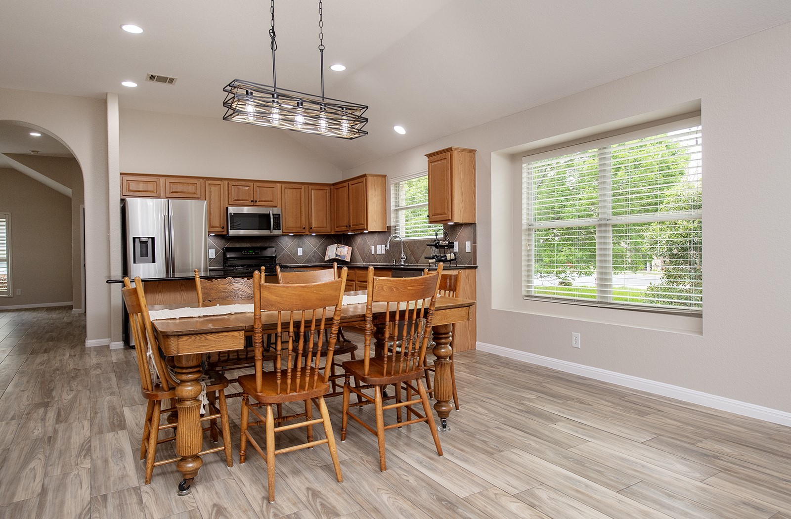 118 Chestnut Court Georgetown, TX 78633 - Photo 11 of 31 a view of a dining room with furniture window and wooden floor