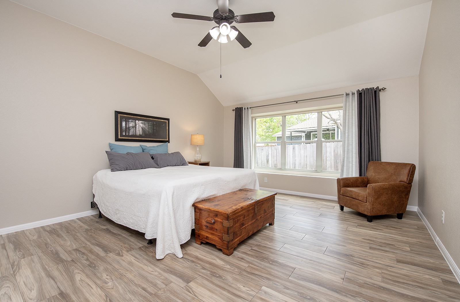 118 Chestnut Court Georgetown, TX 78633 - Photo 14 of 31 a spacious bedroom with a bed and a couch