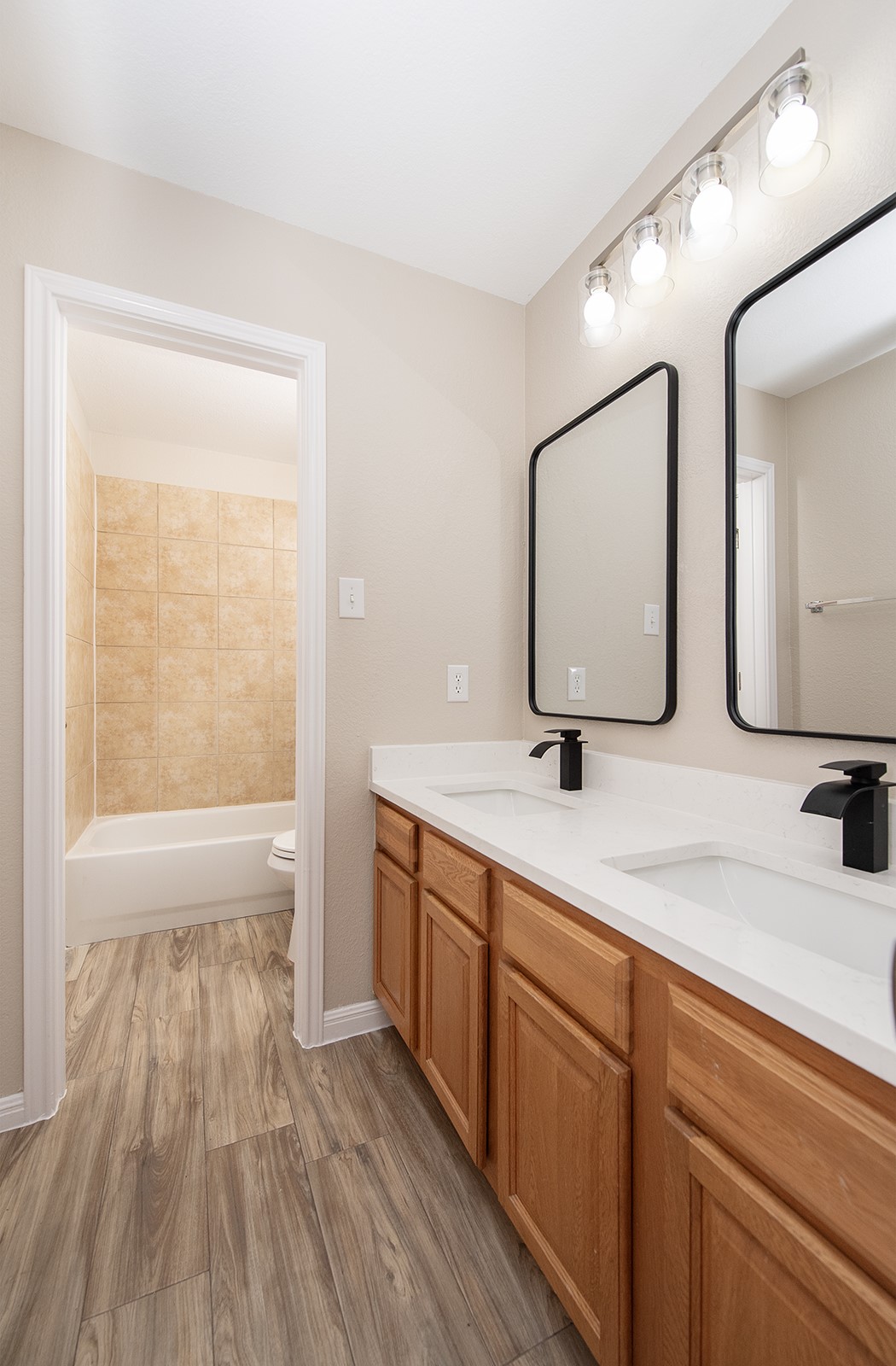 118 Chestnut Court Georgetown, TX 78633 - Photo 21 of 31 a bathroom with a double vanity sink and a mirror