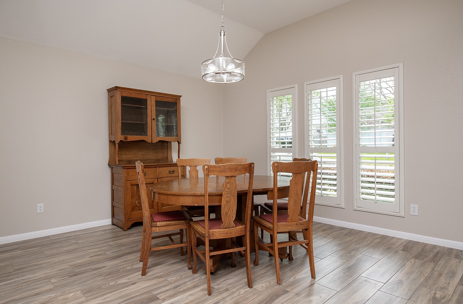 118 Chestnut Court Georgetown, TX 78633 - Photo 5 of 31 a view of a dining room with furniture and wooden floor
