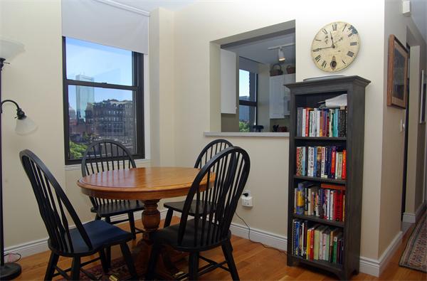 4 Charlesgate East, Unit 602 Boston, MA 02215 - Photo 3 of 10 a view of a dining room with furniture and a window