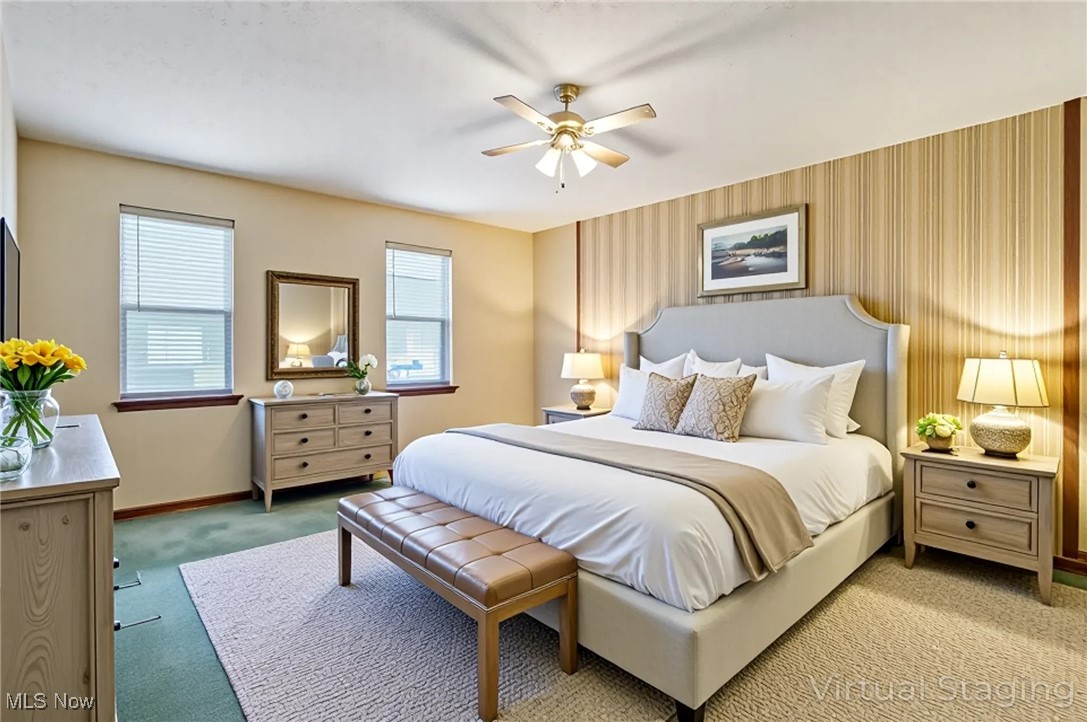 7300 Morley Road Painesville, OH 44077 - Photo 6 of 50 Carpeted bedroom featuring a ceiling fan and baseboards