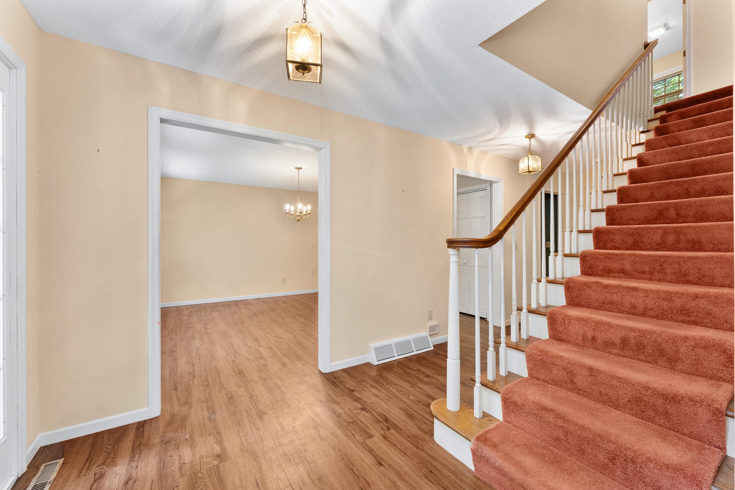 137 Canterbury Road Washington, WI 54701 - Photo 6 of 40 Foyer to dining room and stairs