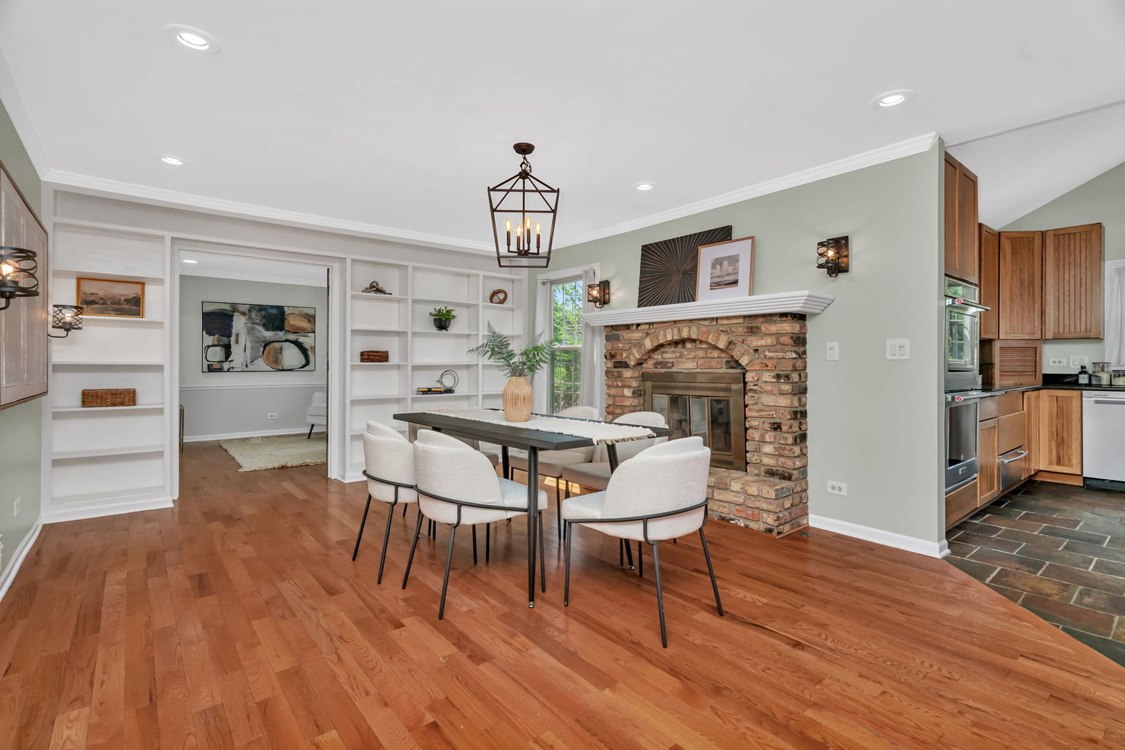 336 Brooklea Court Naperville, IL 60565 - Photo 15 of 39 a living room with furniture and a fireplace
