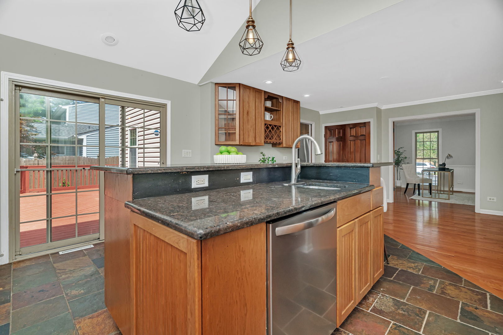 336 Brooklea Court Naperville, IL 60565 - Photo 20 of 39 a kitchen with stainless steel appliances granite countertop a sink and a granite counter tops with a large window