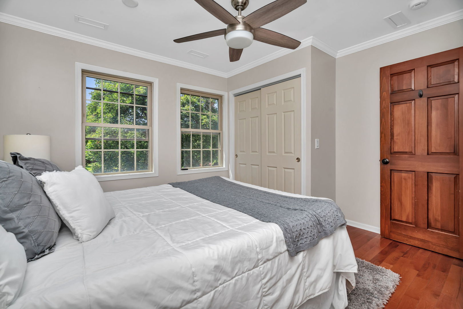 336 Brooklea Court Naperville, IL 60565 - Photo 33 of 39 a bedroom with a bed dresser and a window