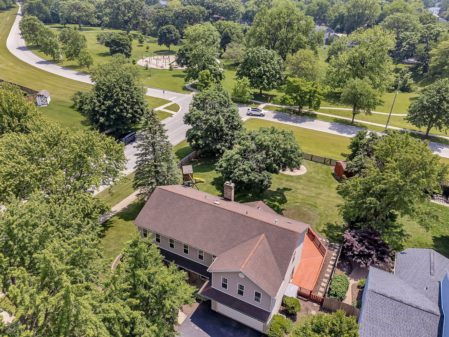 336 Brooklea Court Naperville, IL 60565 - Photo 6 of 39 an aerial view of a house with a yard and lake view