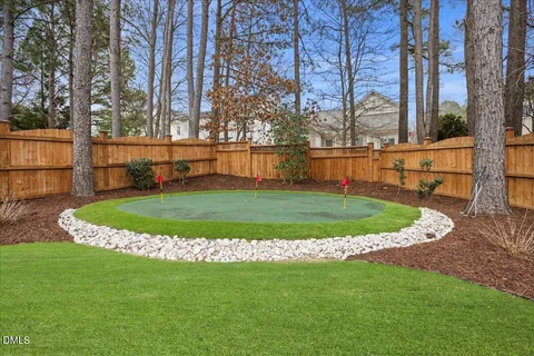 a view of a park with large trees
