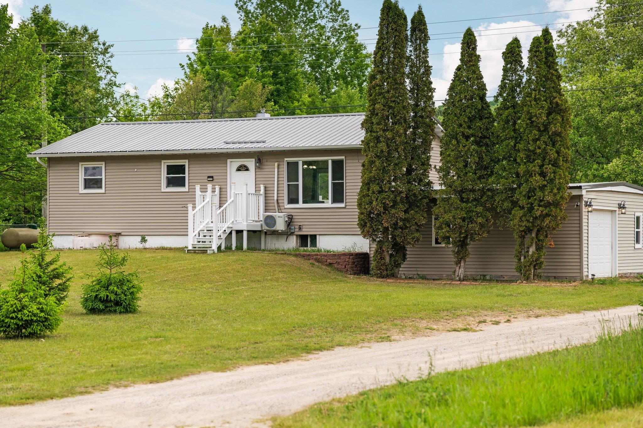 738 Boardman Road South Boardman, MI 49680 - Photo 1 of 24 1934958-c045a275-3708-4973-9dc6-91a2169c6cac.JPG