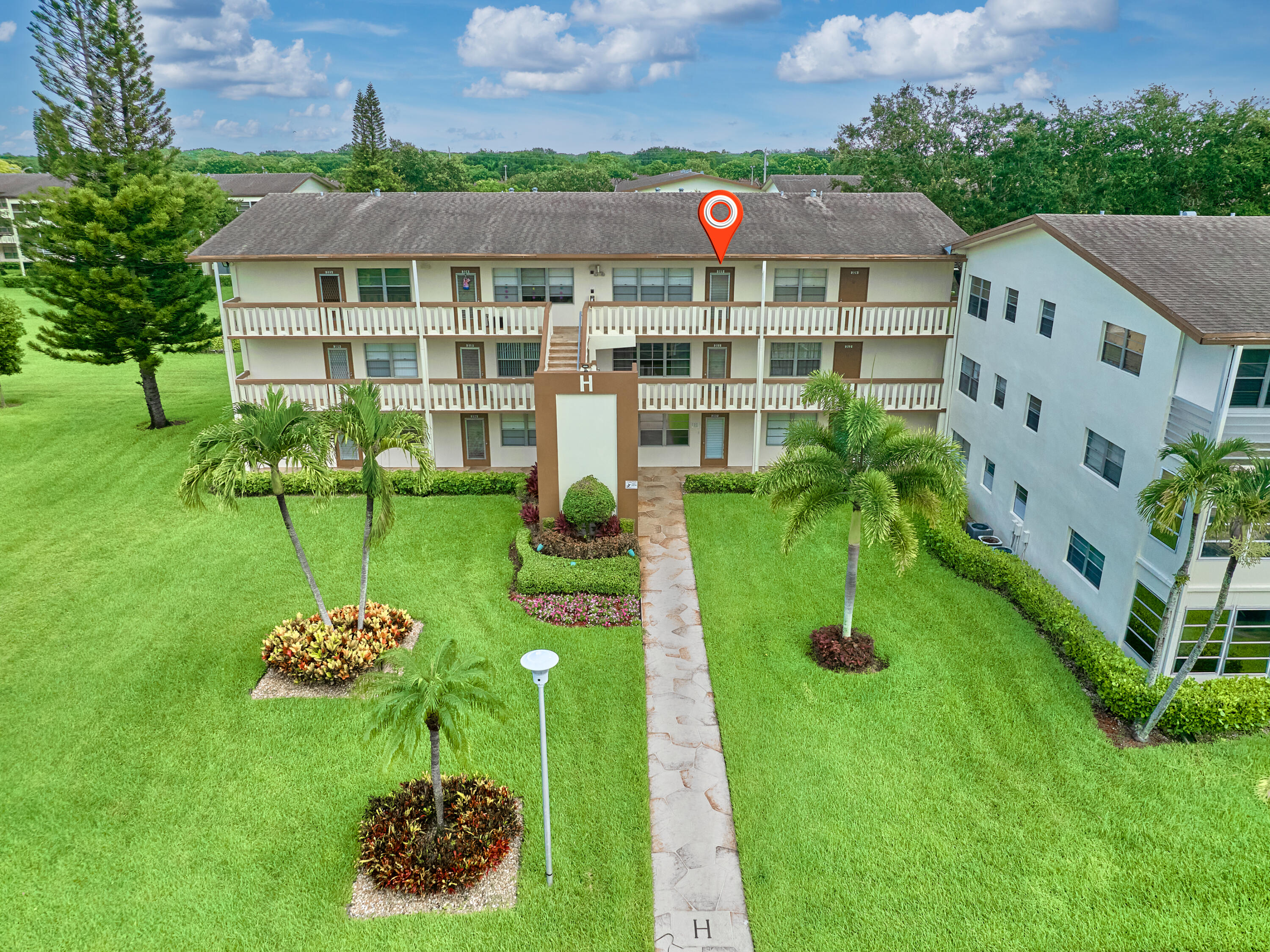 325 Mansfield Drive, Unit 325H Boca Raton, FL 33434 - Photo 1 of 17 Front of Structure