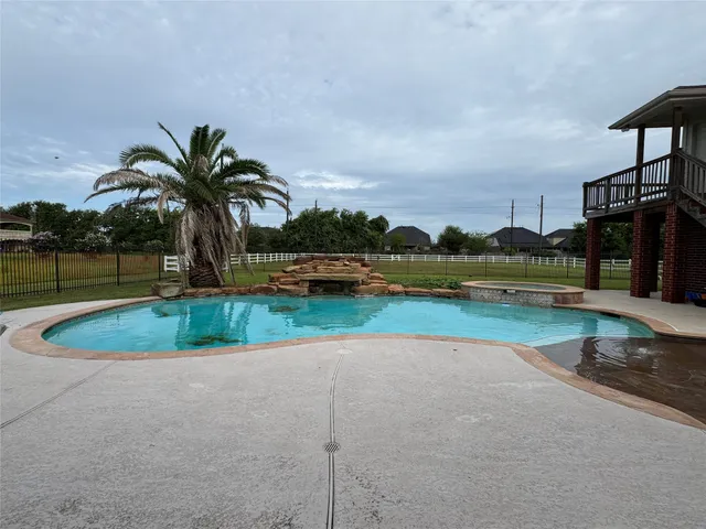 a view of outdoor space yard and swimming pool