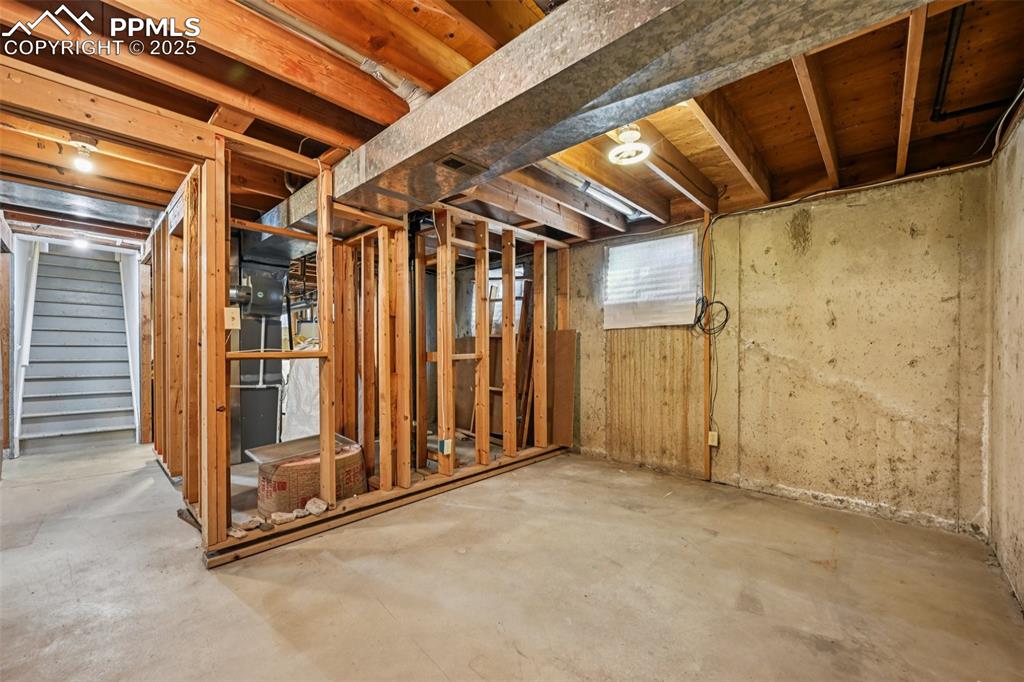 2977 South Oneida Street Denver, CO 80224 - Photo 40 of 50 a view of a room with wooden walls