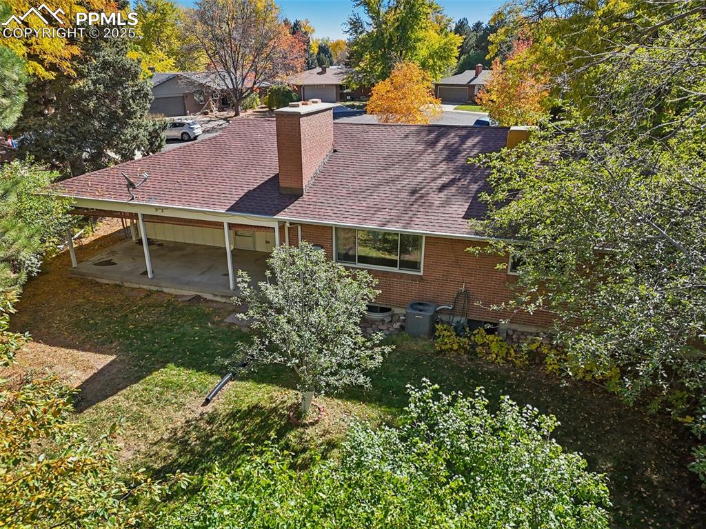 2977 South Oneida Street Denver, CO 80224 - Photo 9 of 50 a house view with a garden space