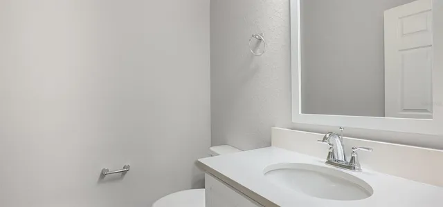 a bathroom with a sink and a toilet