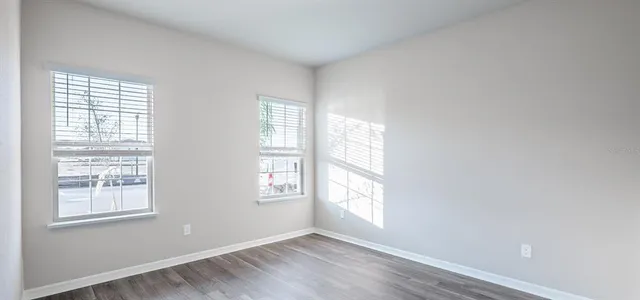 an empty room with windows