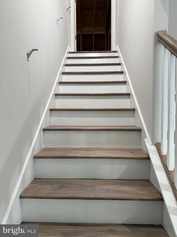 a view of a porch with a door and balcony
