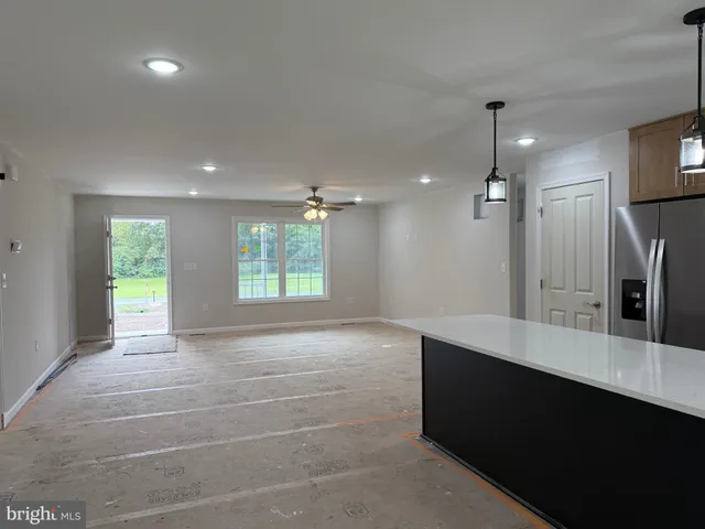 a bathroom with a double vanity sink and a large mirror