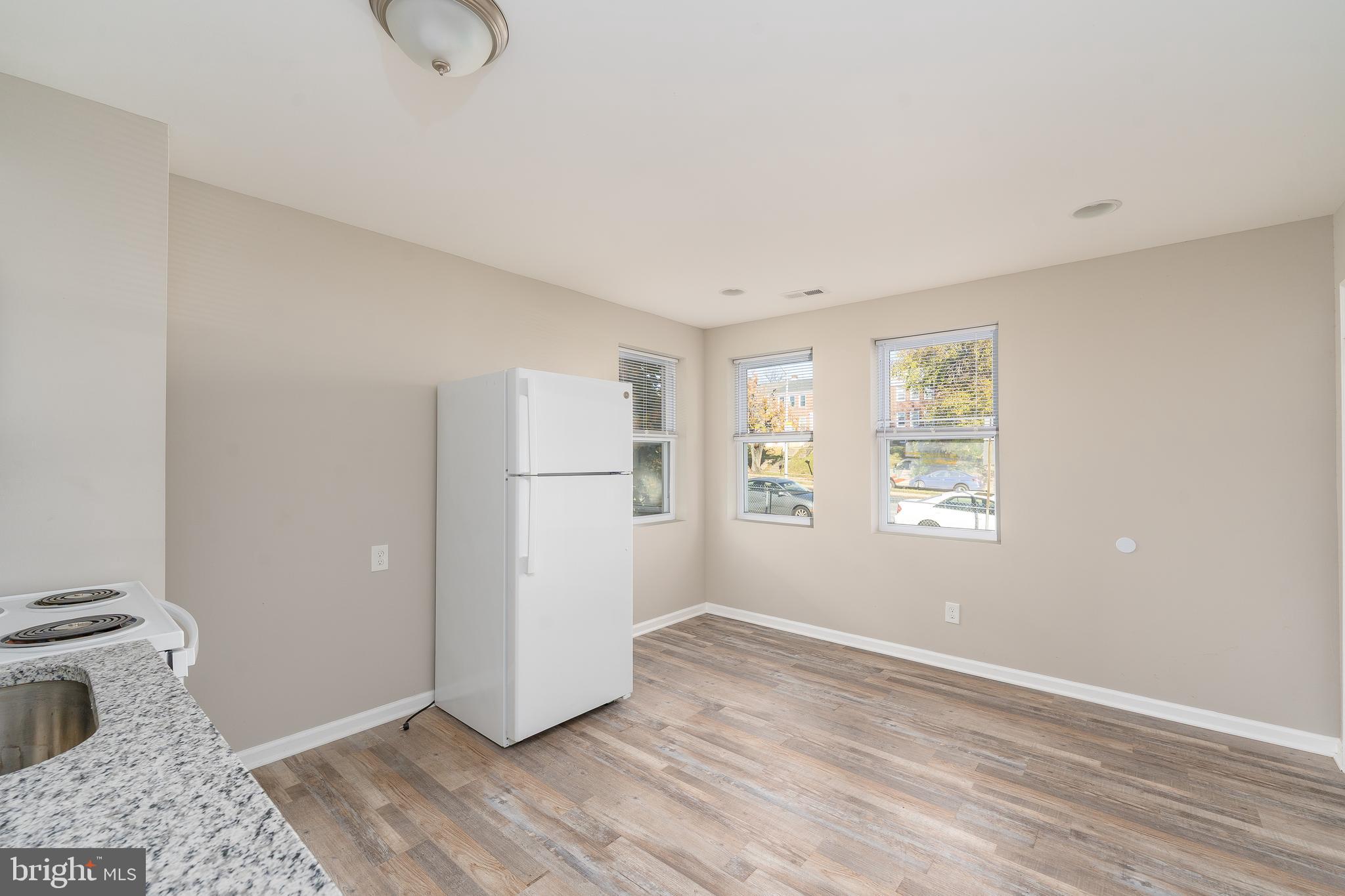 1655 East Cold Spring Lane Baltimore, MD 21218 - Photo 4 of 9 Kitchen Living Area