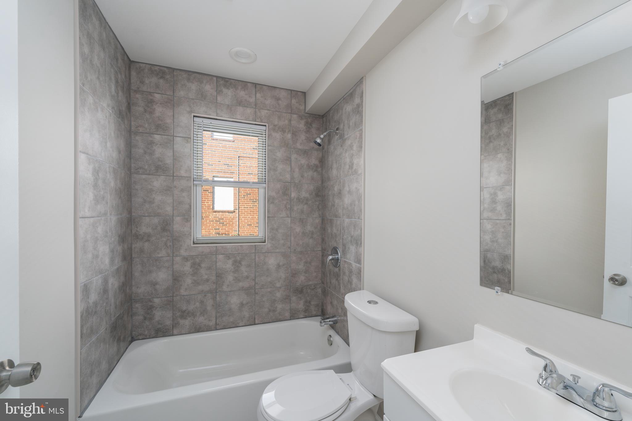 1655 East Cold Spring Lane Baltimore, MD 21218 - Photo 5 of 9 Full Bathroom
