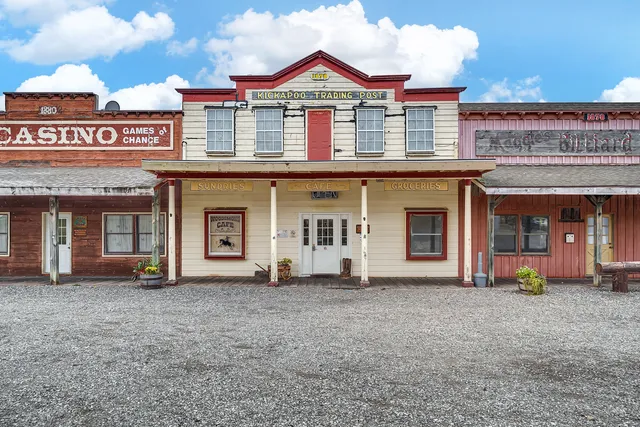 a front view of a building with retail shops