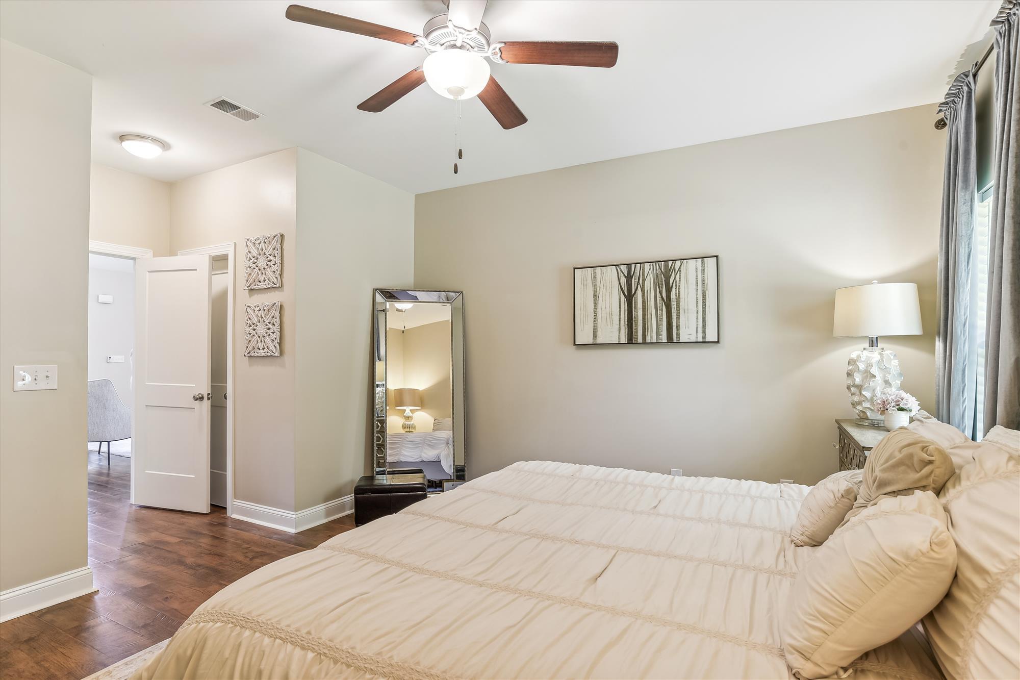 5914 Yellow Dog Road Ravenel, SC 29470 - Photo 19 of 36 main level-primary bedroom-_dsc0251