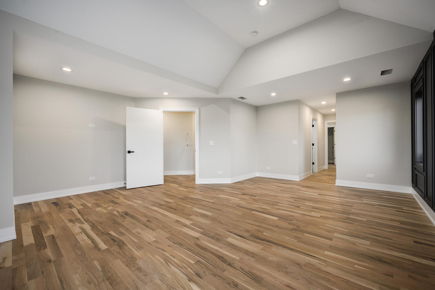 22642 Frontier Court Frankfort, IL 60423 - Photo 20 of 29 a view of an empty room with wooden floor and a window
