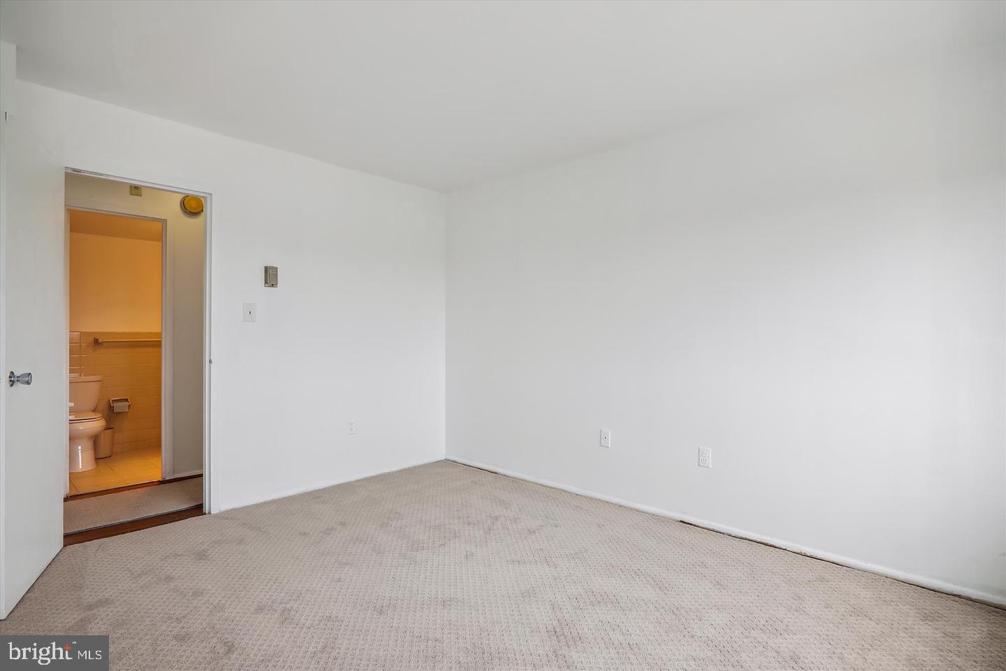 1111 University Boulevard West, Unit 1003 Silver Spring, MD 20902 - Photo 21 of 38 a view of an empty room