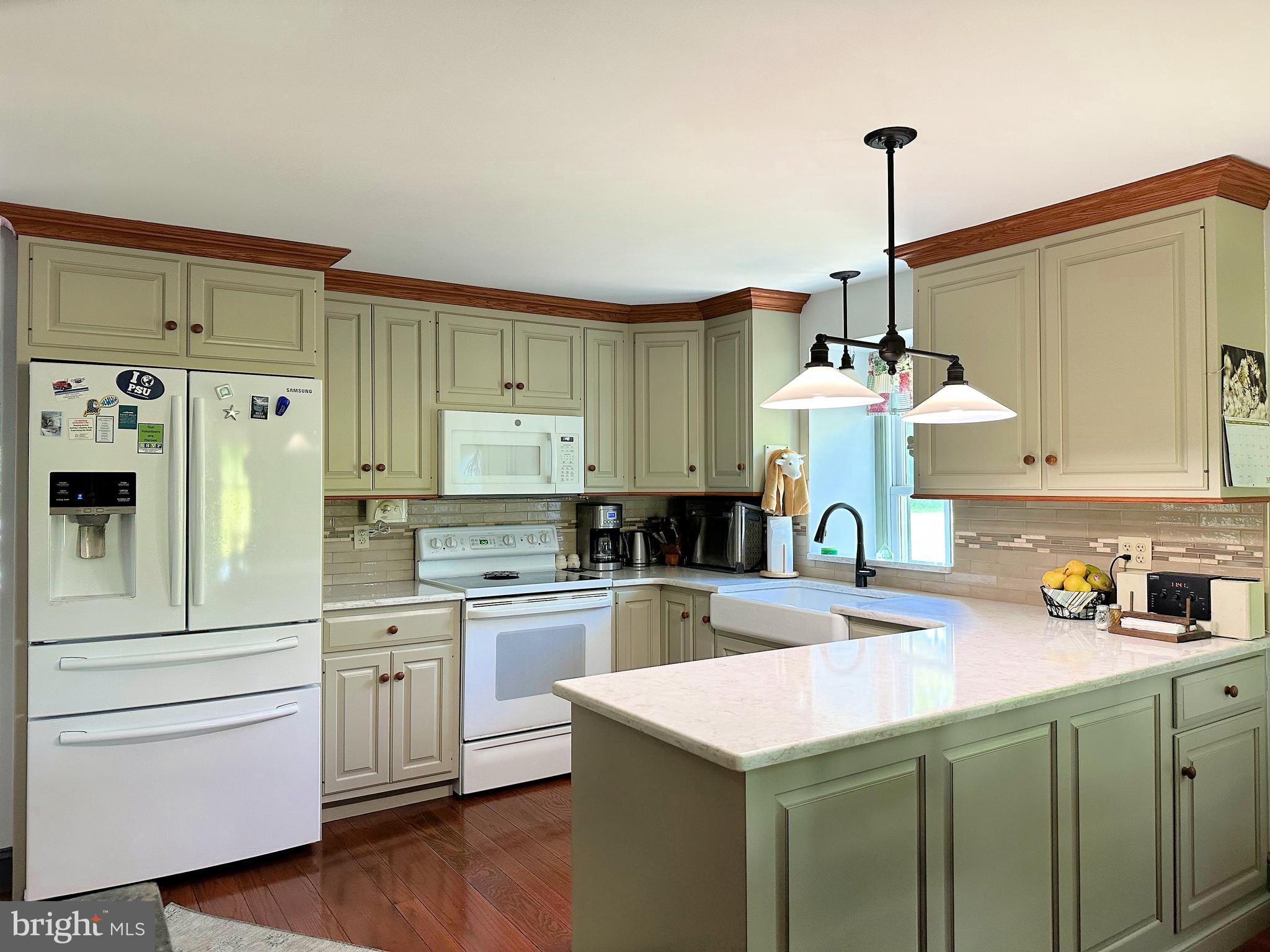 2382 Bergey Road Harleysville, PA 19438 - Photo 23 of 52 a kitchen with a sink and cabinets