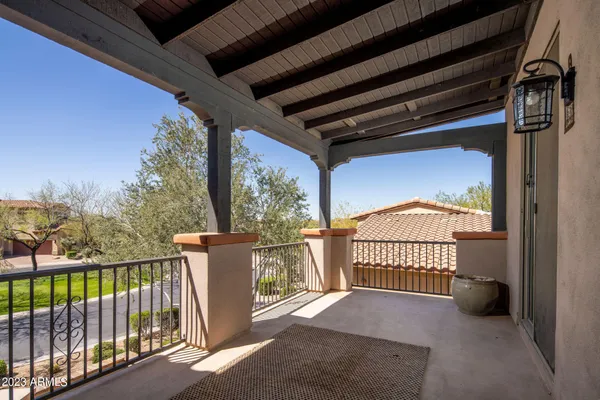 a view of a porch with wooden floor