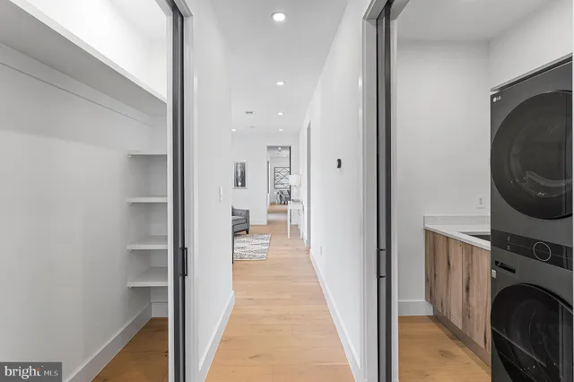 a view of a refrigerator in kitchen and window